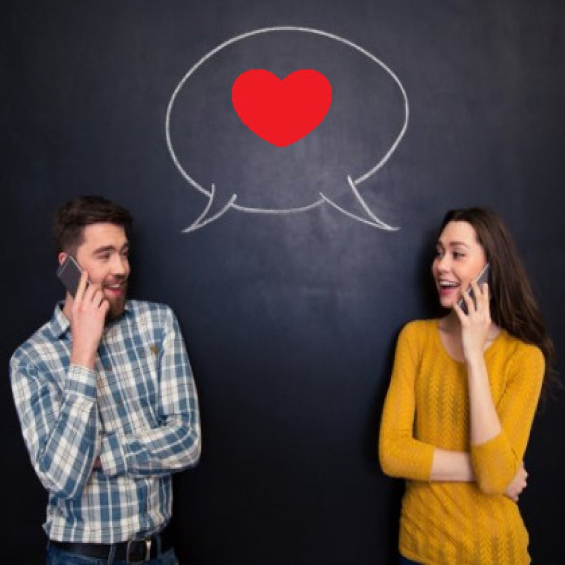 man and woman couple talking on phones facing each other in front of a chalkboard. a chalk text bubble shown between them with a red heart inside.
