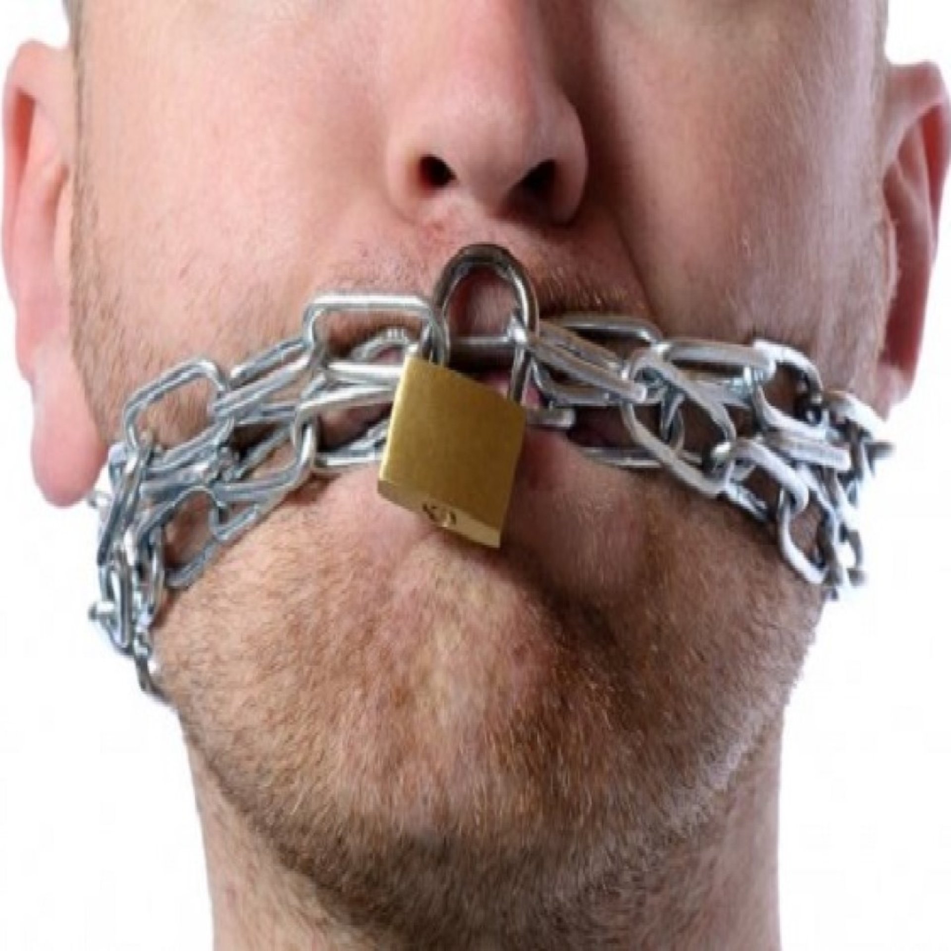bottom of man's face with silver chain and gold lock on mouth