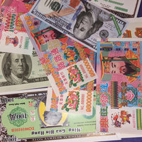 various colored joss paper notes spread out in a pile on a purple background